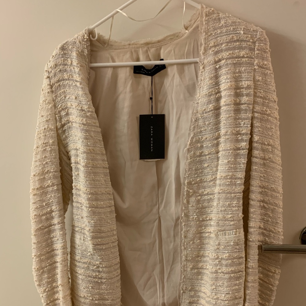 Opened stripped fabric jacket w/ shoulder pads